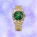 Gold day date green dial